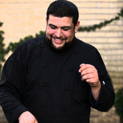 Smiling man wearing a black shirt